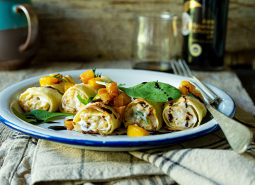 Cannelloni ripieni di ricotta, spinaci e funghi con dadolata di zucca